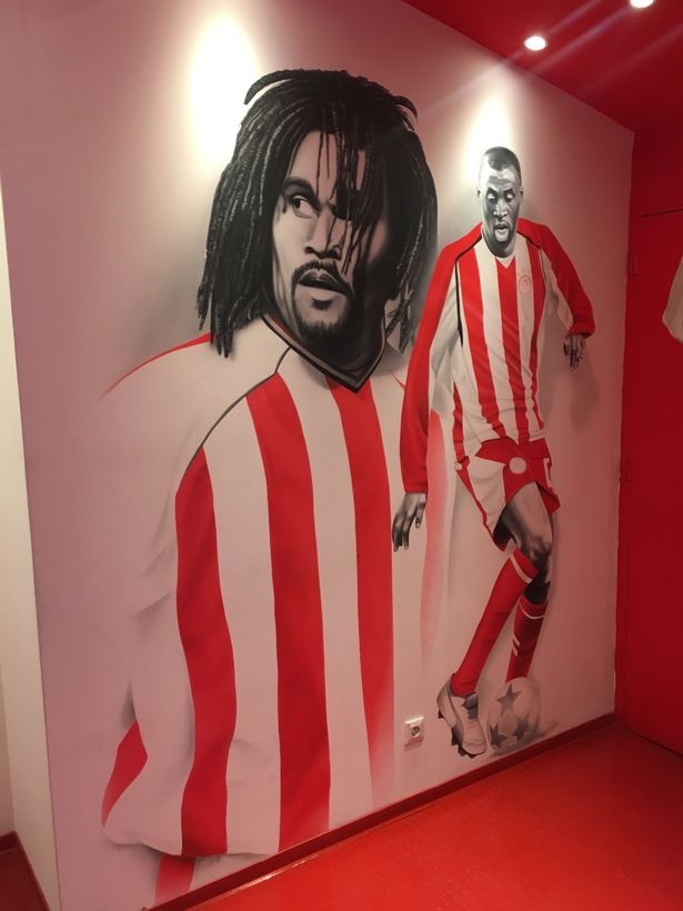 Christian Karembeu is immortalised, along with Yaya Toure, among the wall art in the Olympiacos tunnel