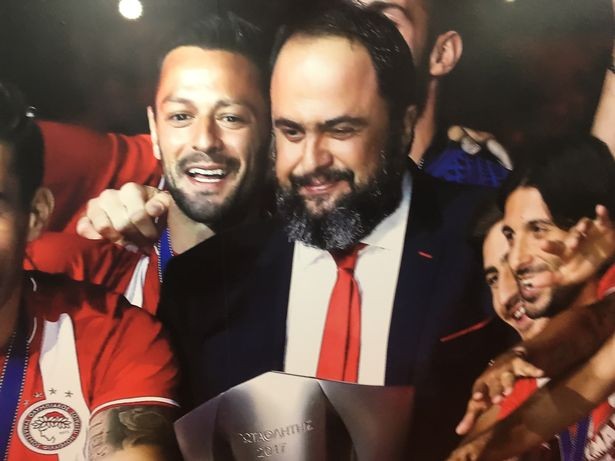 Evangelos Marinakis is included in the wall art in the tunnel at Olympiacos
